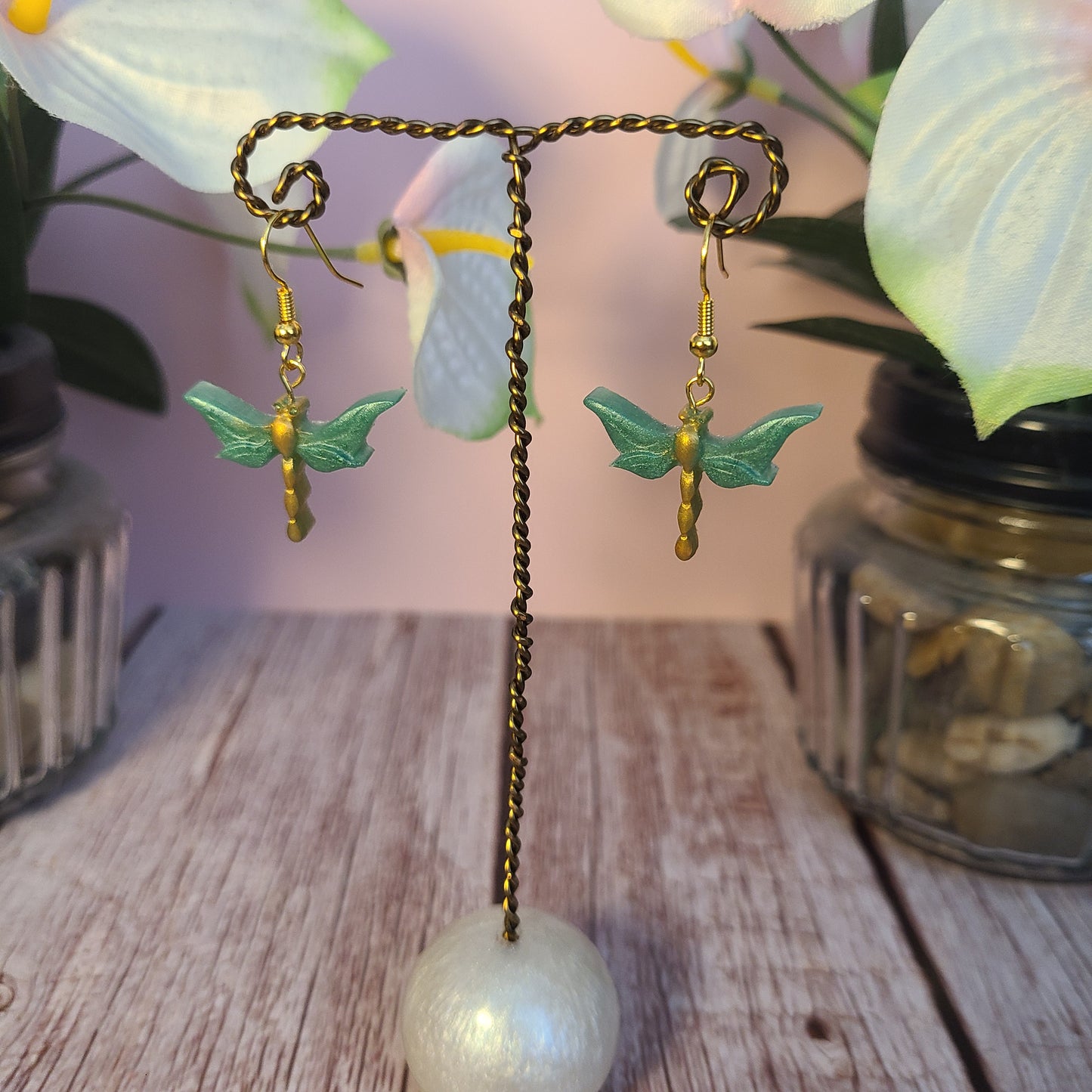 Flower and Winged Creature Earrings