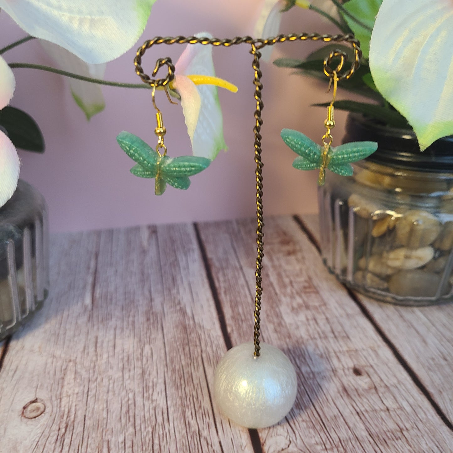 Flower and Winged Creature Earrings
