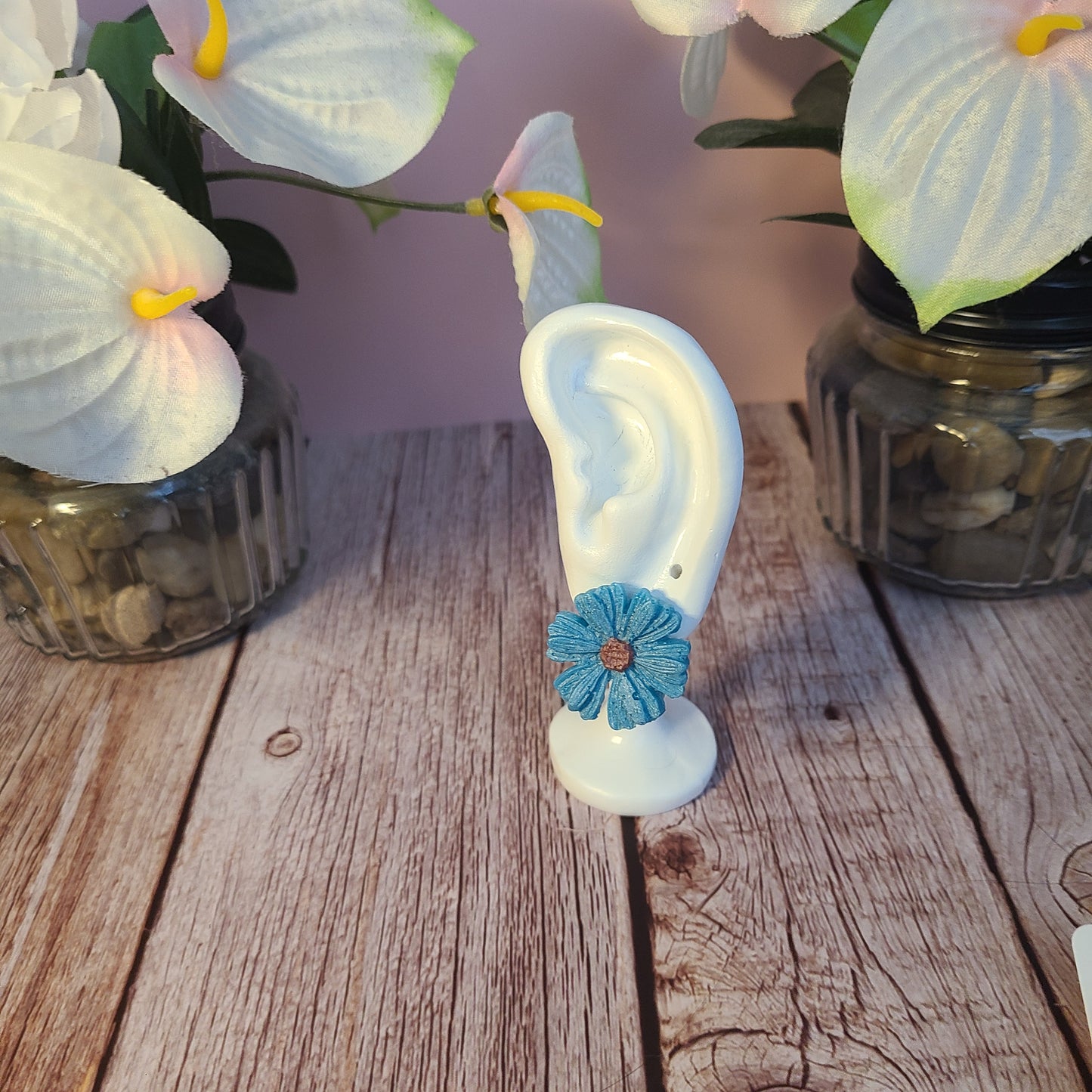 Flower and Winged Creature Earrings