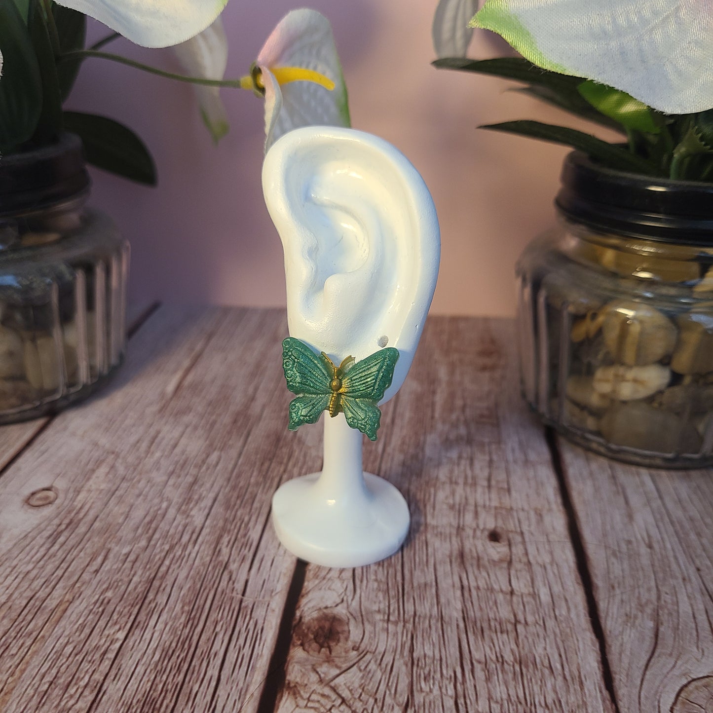 Flower and Winged Creature Earrings