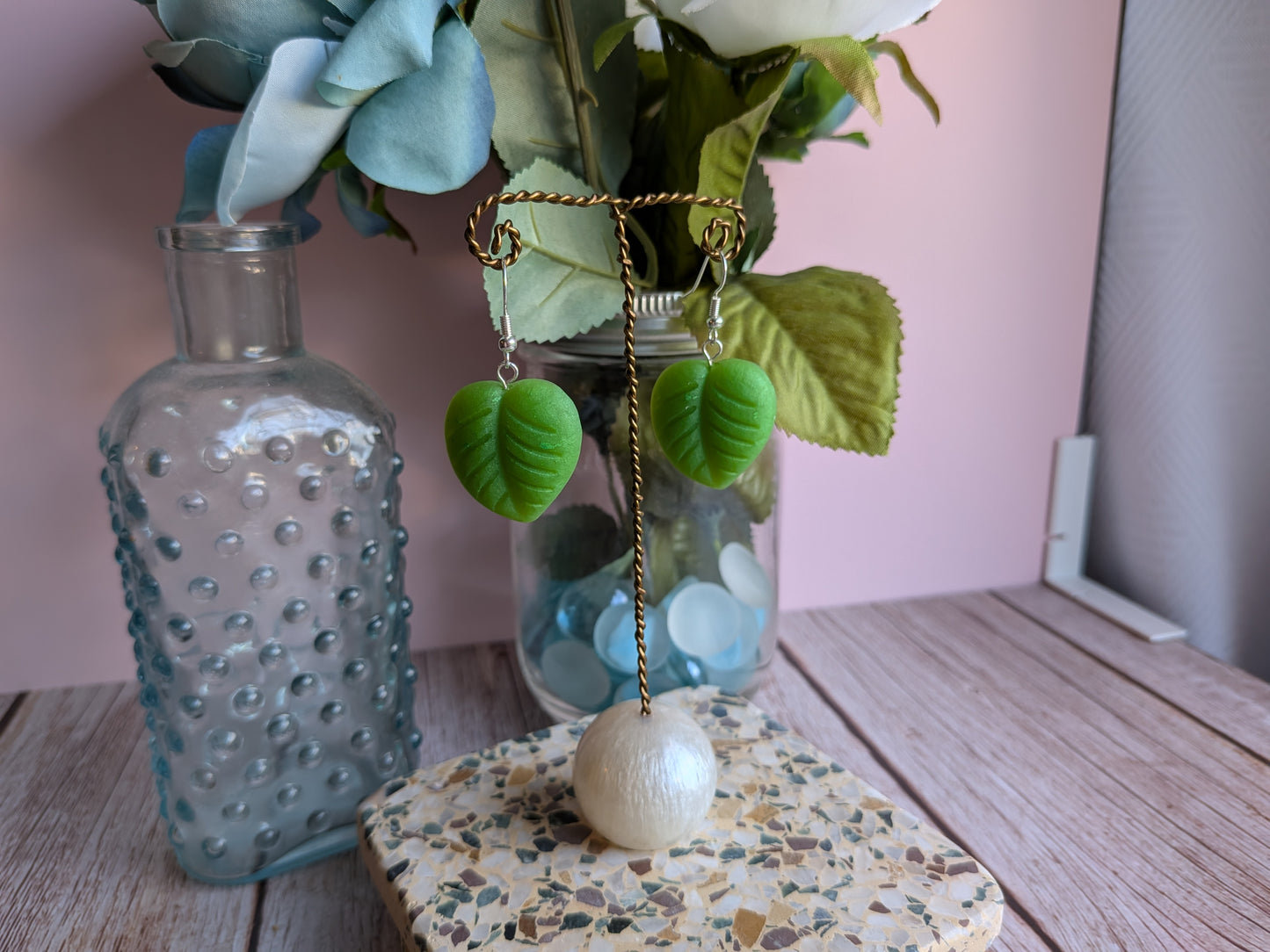 Flower and Winged Creature Earrings