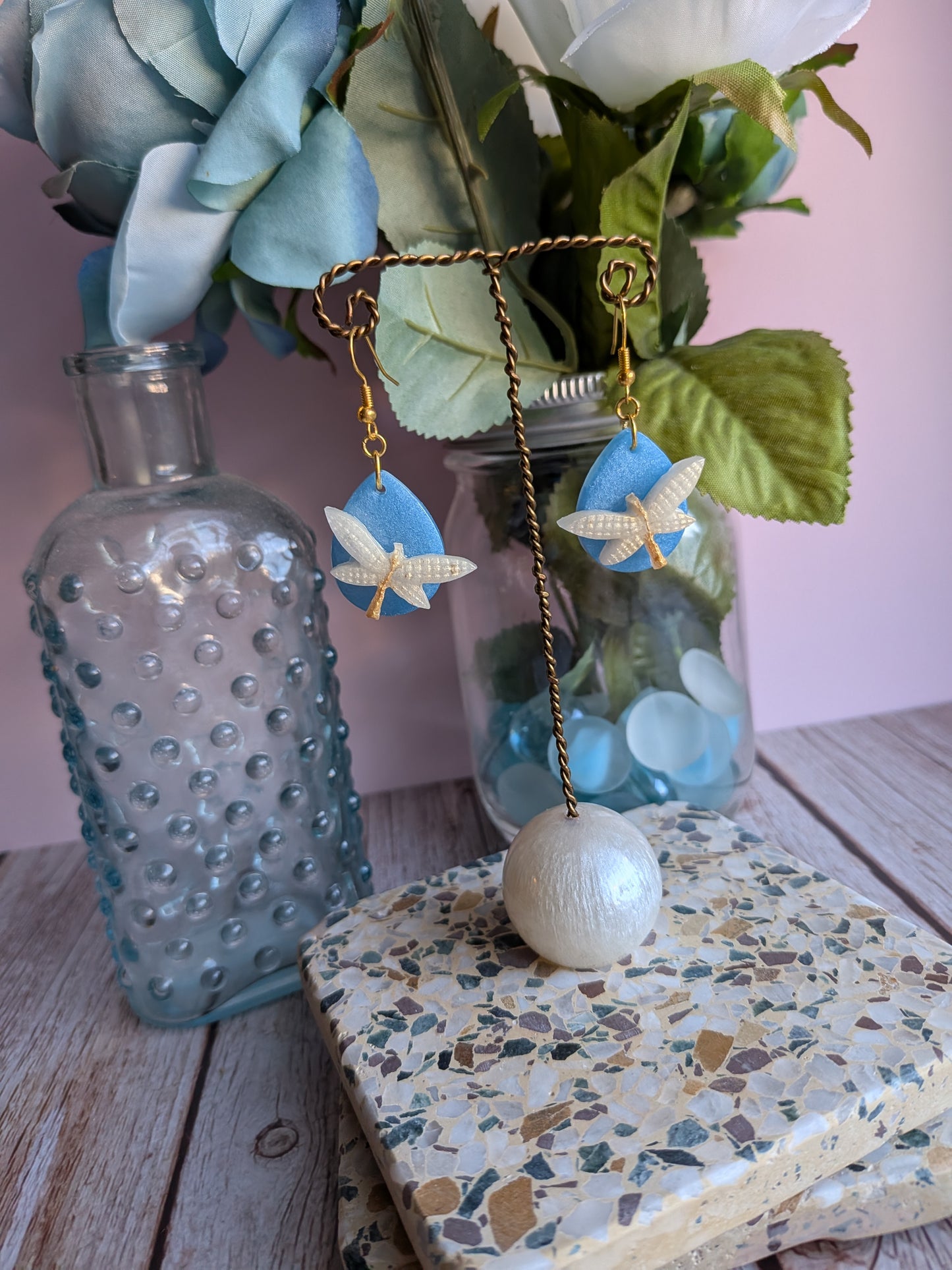 Flower and Winged Creature Earrings