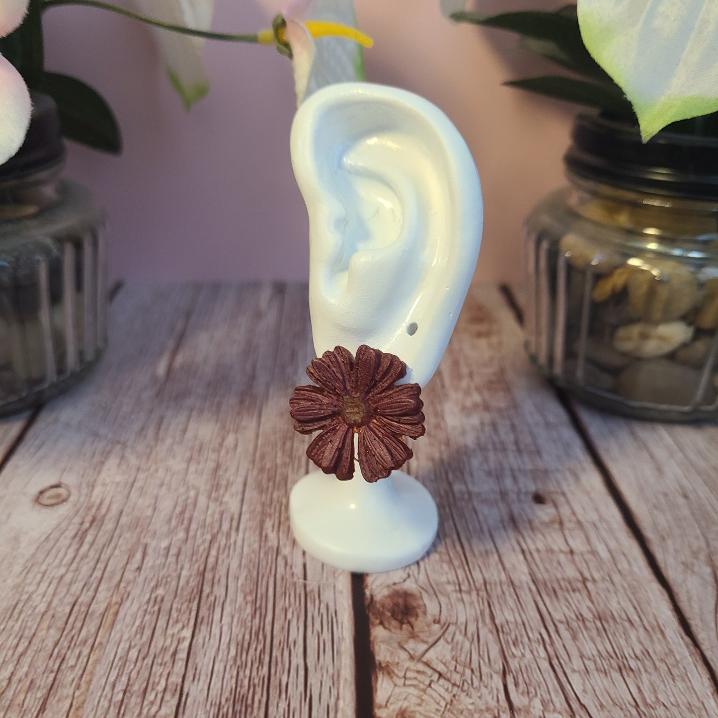Flower and Winged Creature Earrings