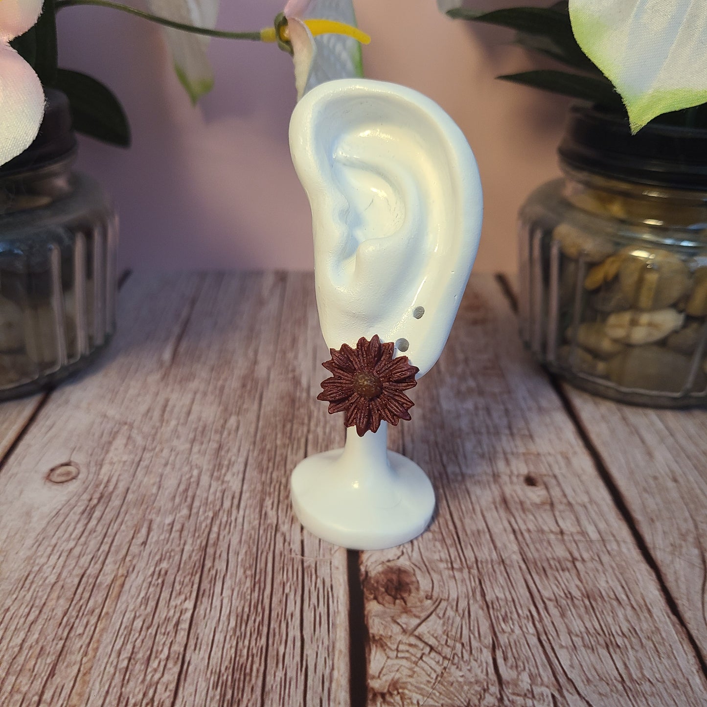 Flower and Winged Creature Earrings