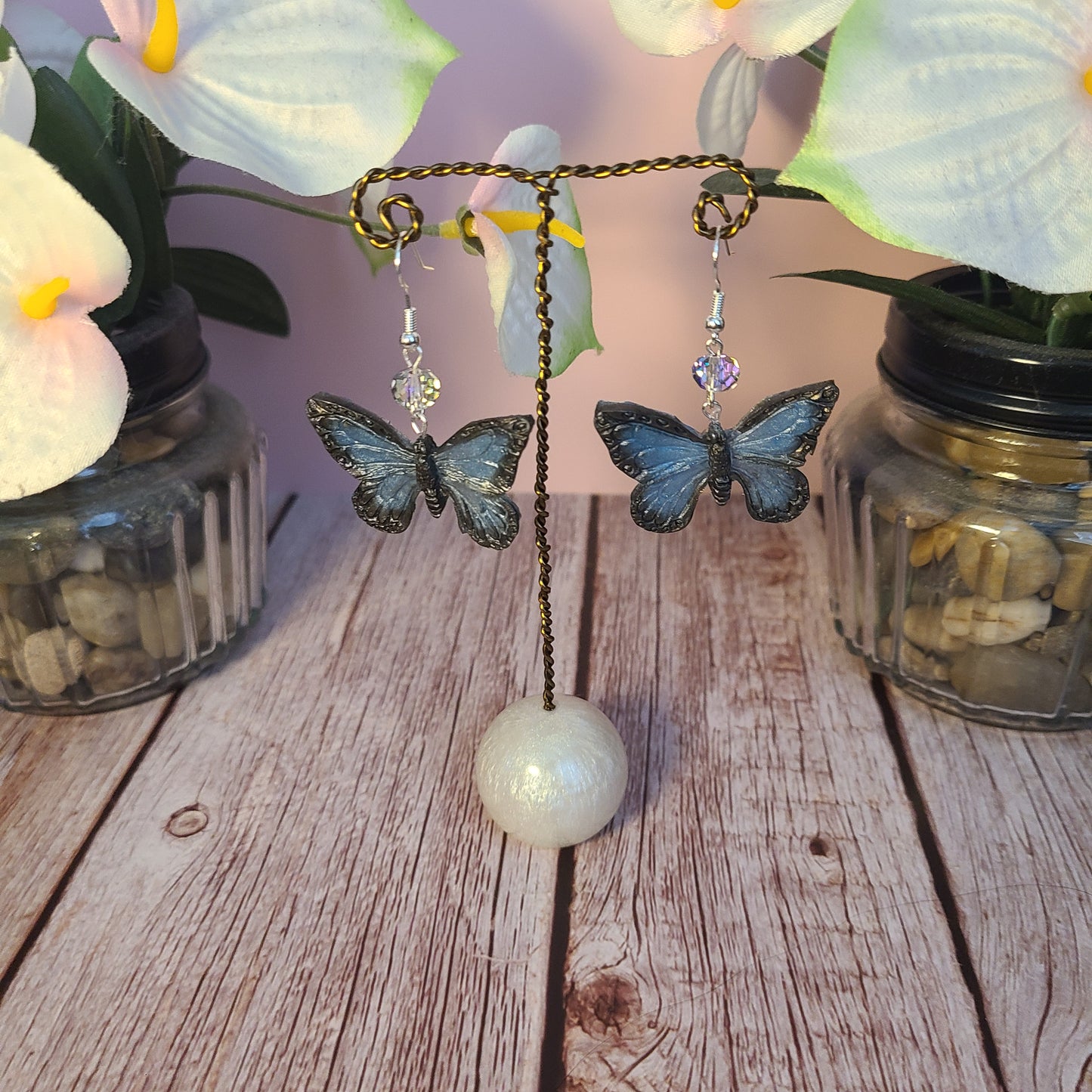 Flower and Winged Creature Earrings
