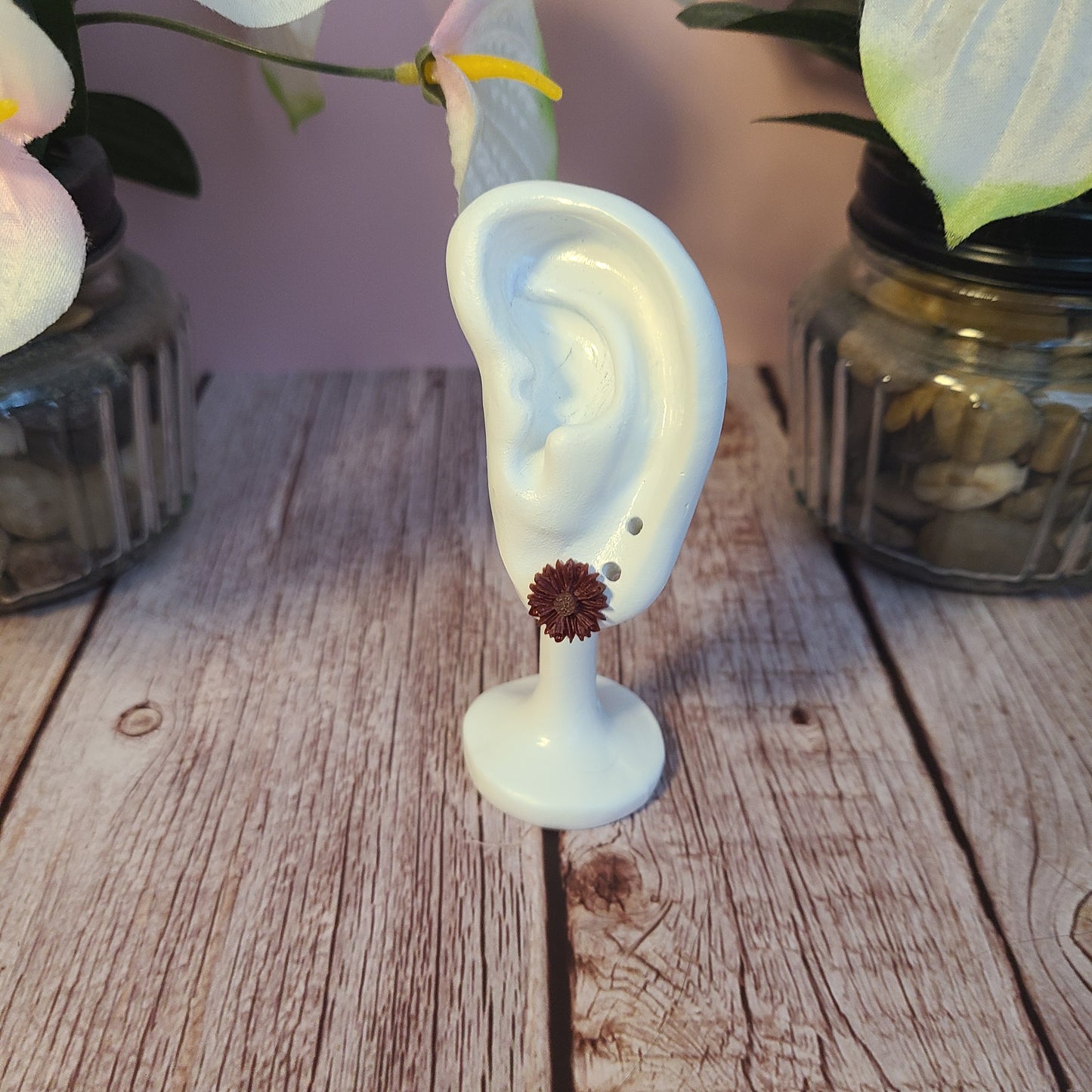 Flower and Winged Creature Earrings