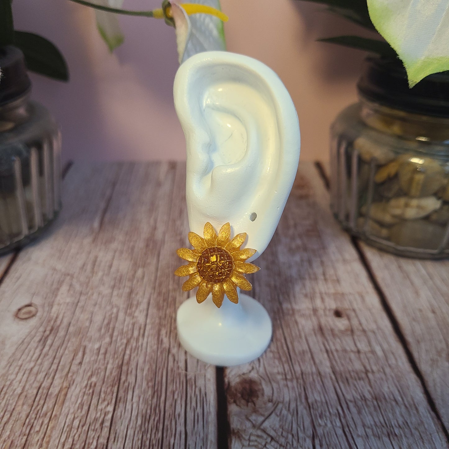 Flower and Winged Creature Earrings